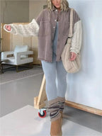 Plus size patchwork denim jacket with cable knit details and raw hem, button-up jean jacket by Plush Fashion Hub.