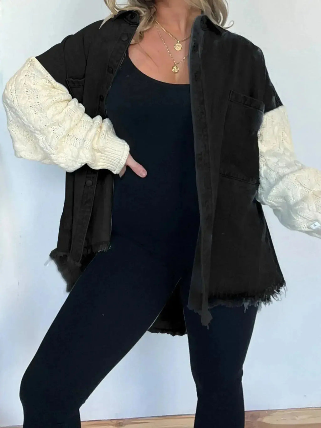 Plus size patchwork denim jacket with cable knit details and raw hem, button-up style from Plush Fashion Hub.