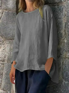 Plus size women's relaxed fit round neck blouse from Plush Fashion Hub, soft stretch casual shirt with a comfortable fit.
