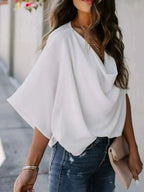 Plus size women's ruched three-quarter sleeve blouse from Plush Fashion Hub, elegant workwear shirt, full view image.