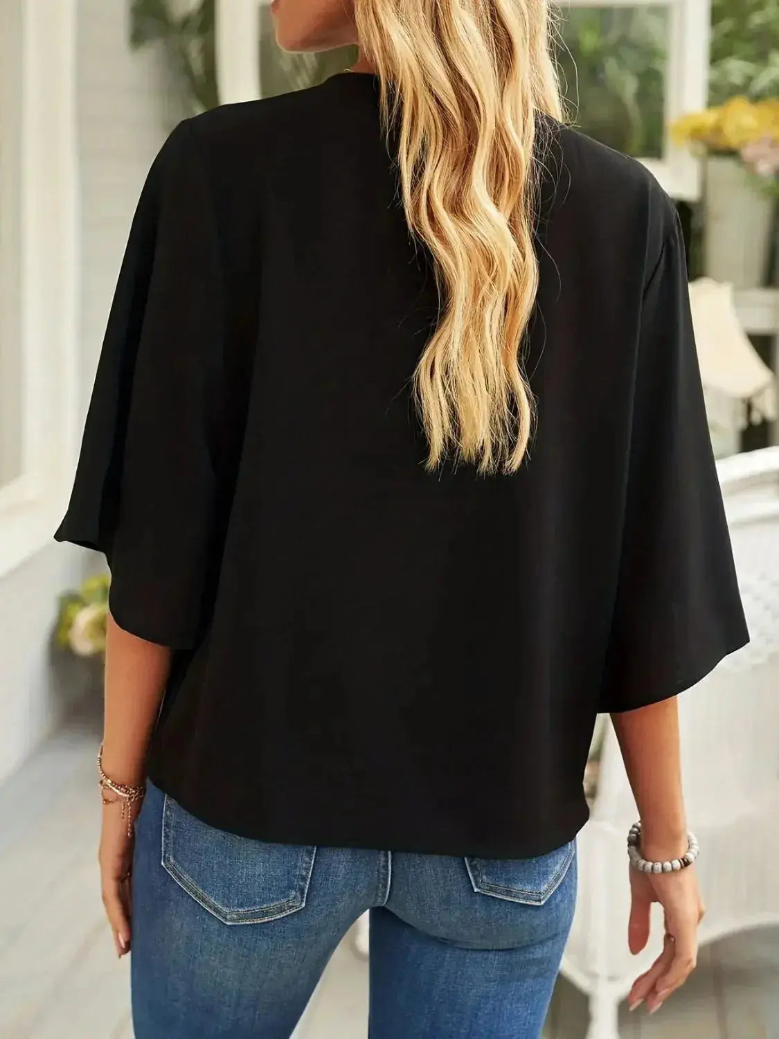 Plus size women's ruched three-quarter sleeve blouse from Plush Fashion Hub, stylish workwear shirt with elegant detailing.