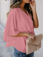 Plus size women's ruched three-quarter sleeve blouse by Plush Fashion Hub, elegant workwear shirt with flattering fit.