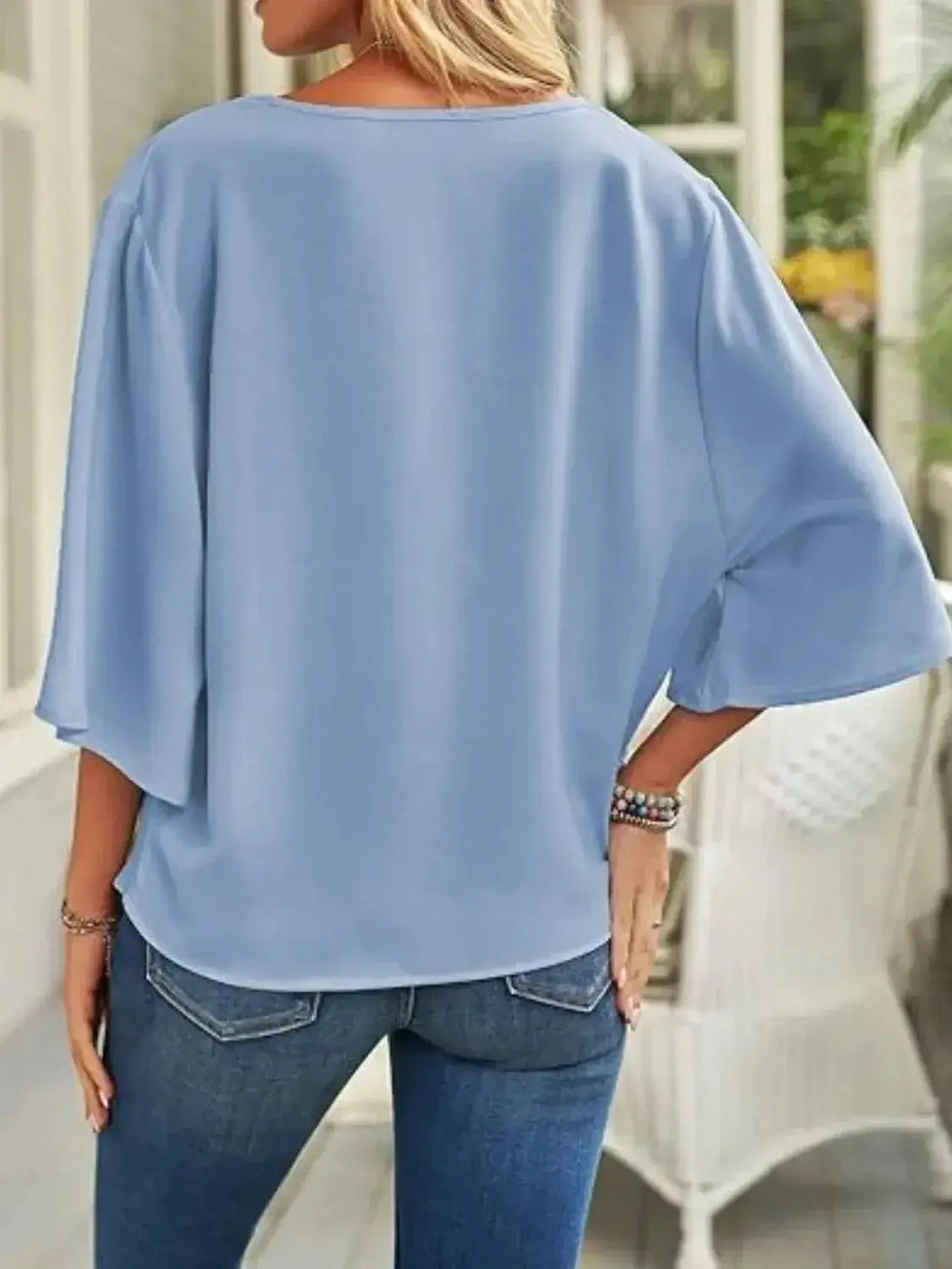 Plus size women's ruched three-quarter sleeve blouse by Plush Fashion Hub, elegant workwear shirt with flattering fit and stylish details.