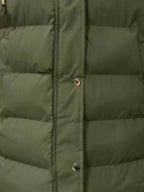 Full-length women's padded hooded vest from Plush Fashion Hub, lightweight sleeveless jacket with snap-down front and longline design.
