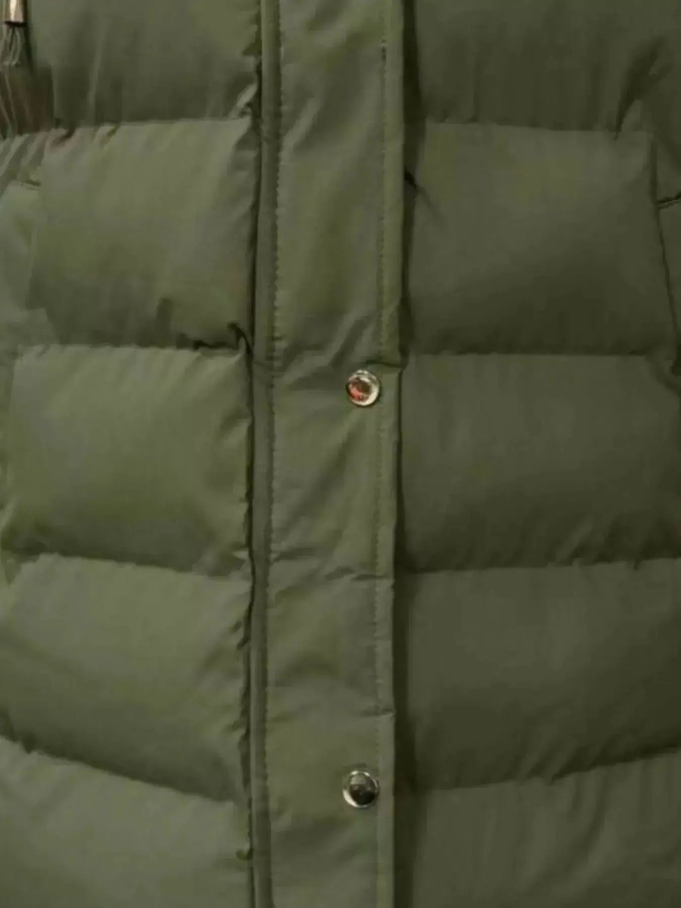Full-length women's padded hooded vest from Plush Fashion Hub, lightweight sleeveless jacket with snap-down front and longline design.