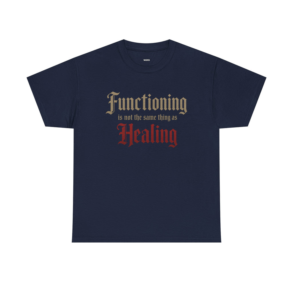 Navy T-shirt from Wear Your Worship with the printed message "Functioning Is Not the Same Thing as Healing" on the front.