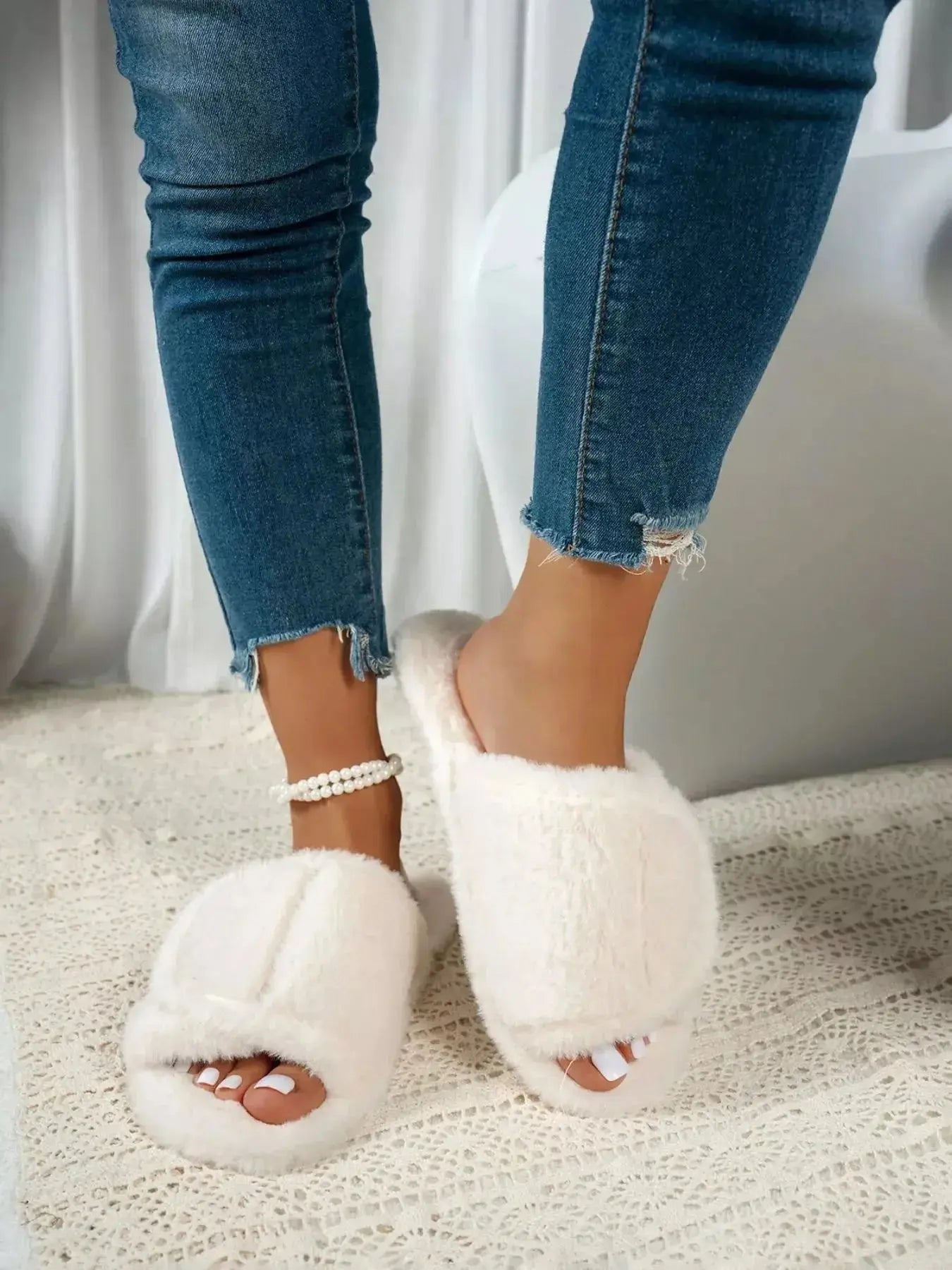 Soft plush fuzzy open-toe slippers with rubber soles from Plush Fashion Hub, perfect for indoor comfort and cozy lounging.