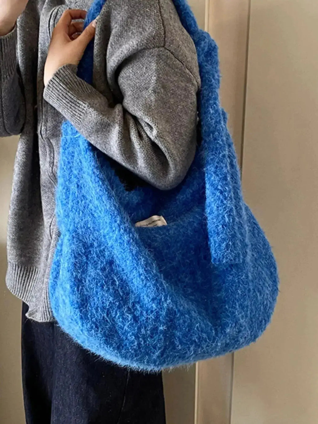 Fuzzy solid color crossbody bag by Plush Fashion Hub featuring plush material and simple design for casual wear.