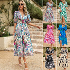 Women’s summer floral V-neck dress by Dukun Design featuring a flowing fabric and vibrant floral pattern.