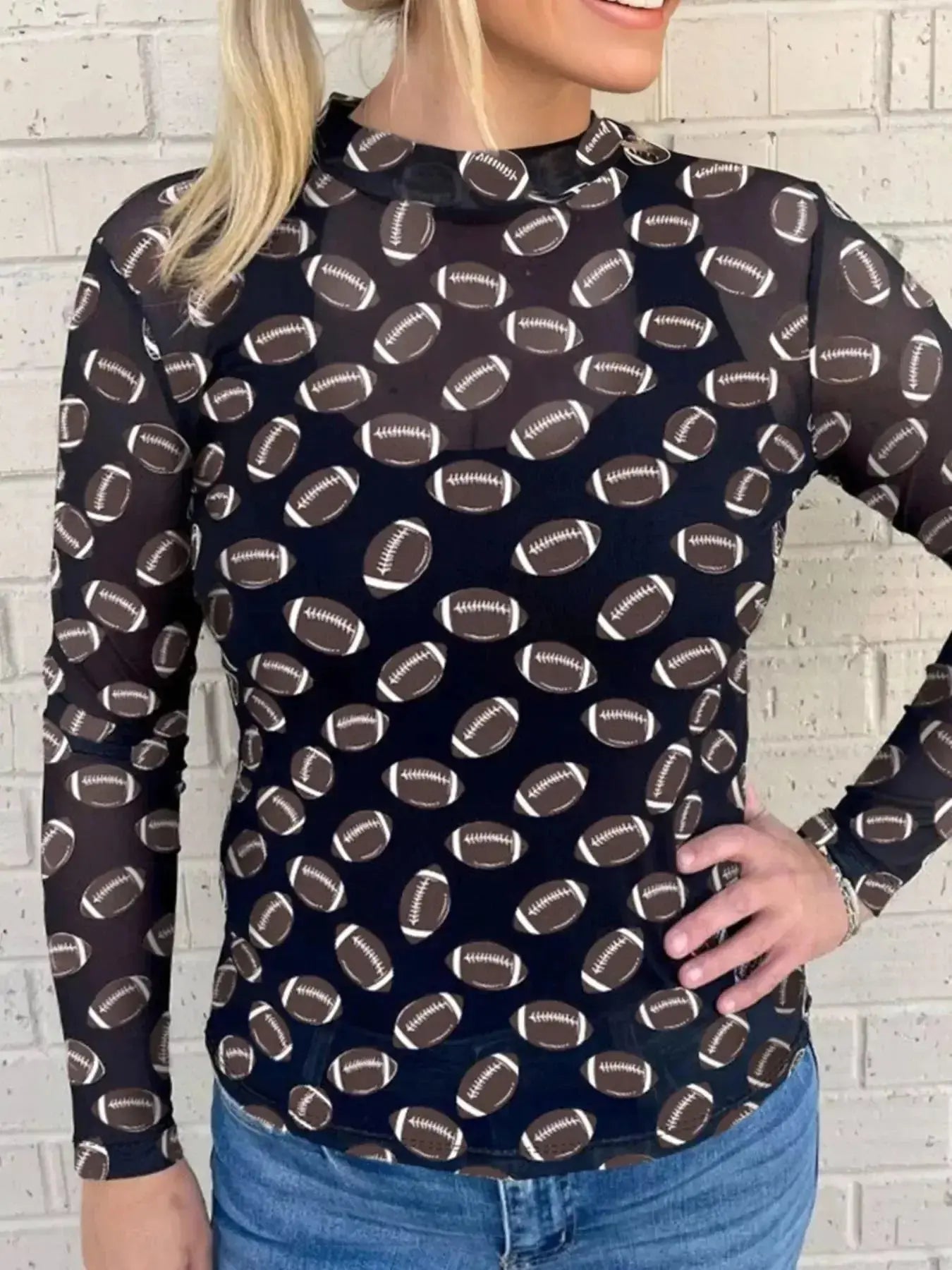 Black sheer mesh long sleeve top by Plush Fashion Hub, breathable stretch fit, perfect for layering and game day outfits.