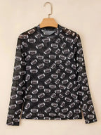 Plush Fashion Hub Game Day sheer mesh long sleeve top with breathable stretch fit, ideal for layering and sporty style.