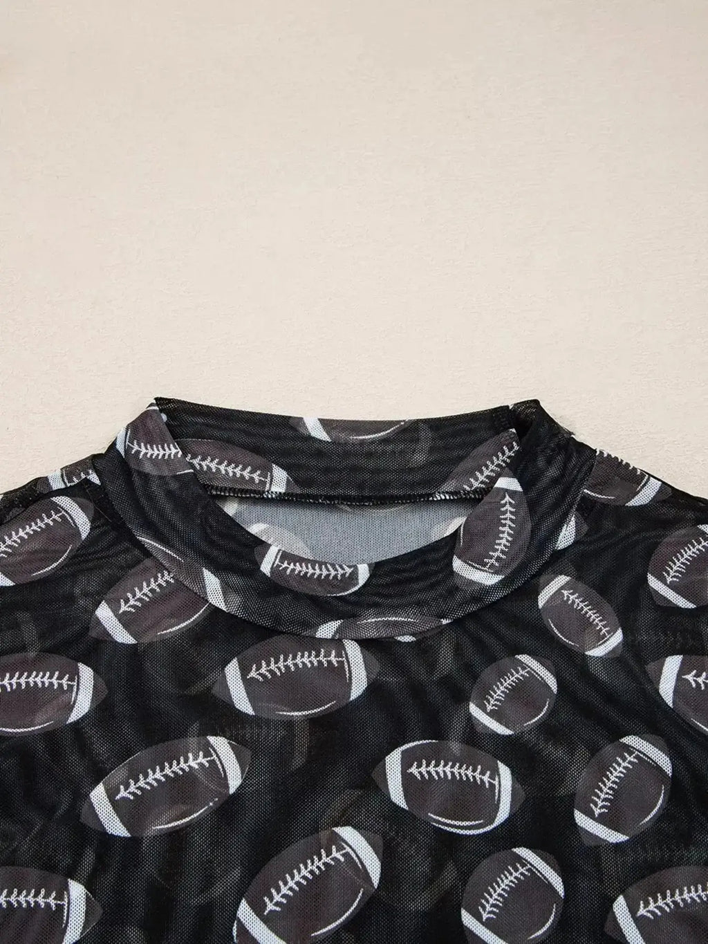 Black sheer mesh long sleeve top by Plush Fashion Hub, breathable stretch fit, perfect for layering on game day.