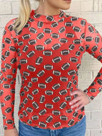Plush Fashion Hub game day sheer mesh long sleeve top with breathable stretch fit, perfect for layering and stylish wear.