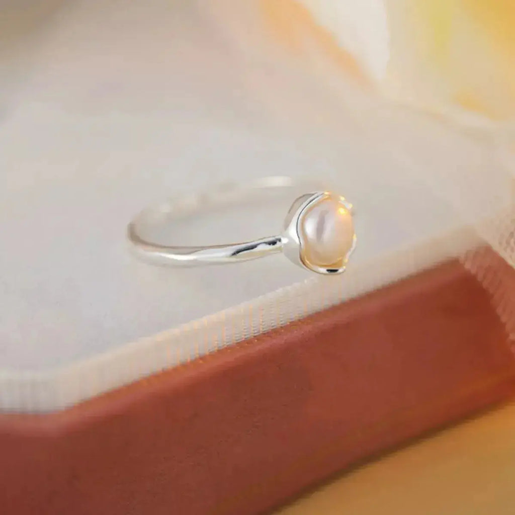 Genuine freshwater pearl adjustable open ring in 925 sterling silver, featuring a sleek and elegant design.