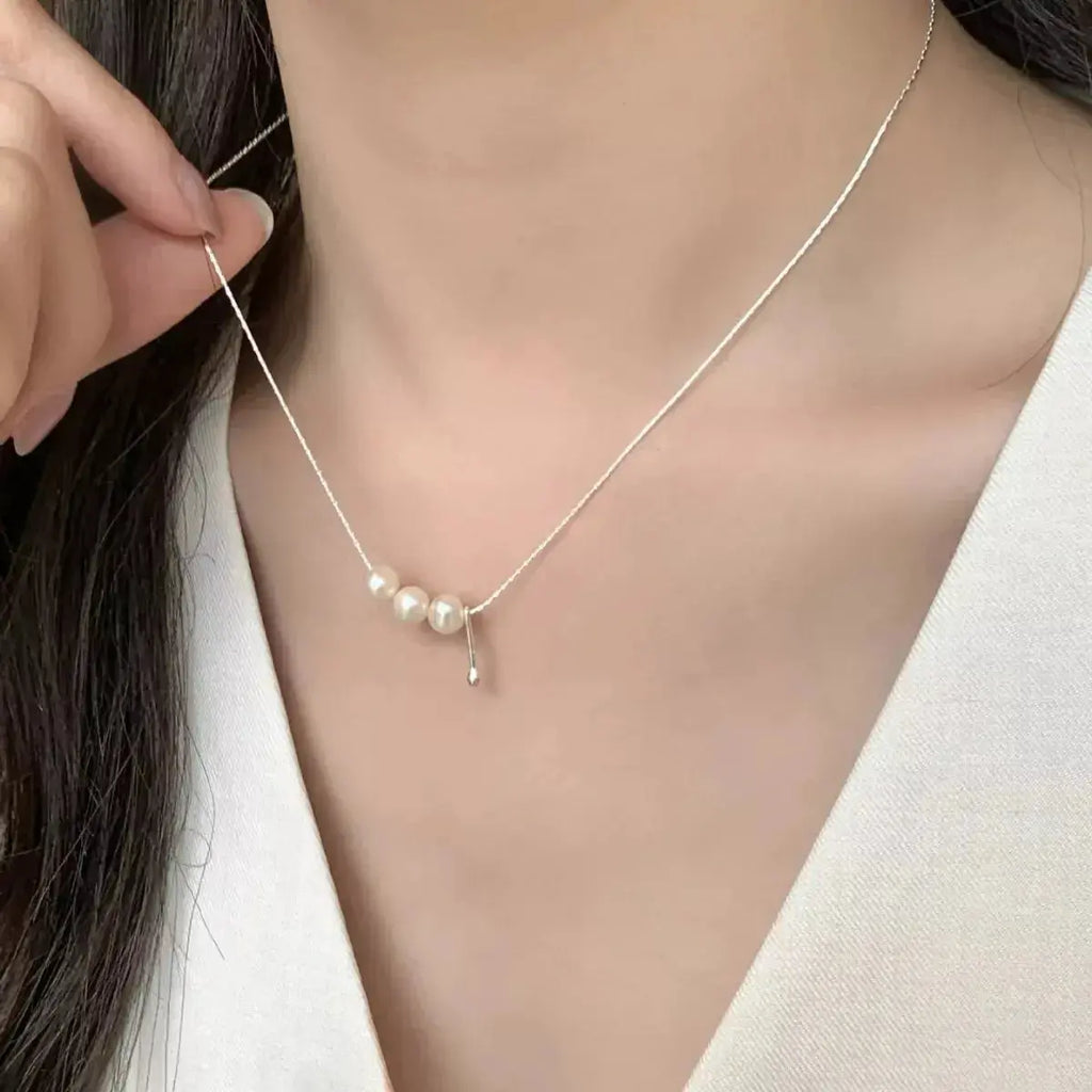 Genuine freshwater pearl pendant necklace with sterling silver chain, elegant jewelry by Trendsi.