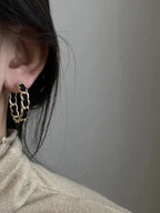 Plush Fashion Hub geometric circular earrings in gold and silver alloy, modern statement jewelry for stylish accessories.