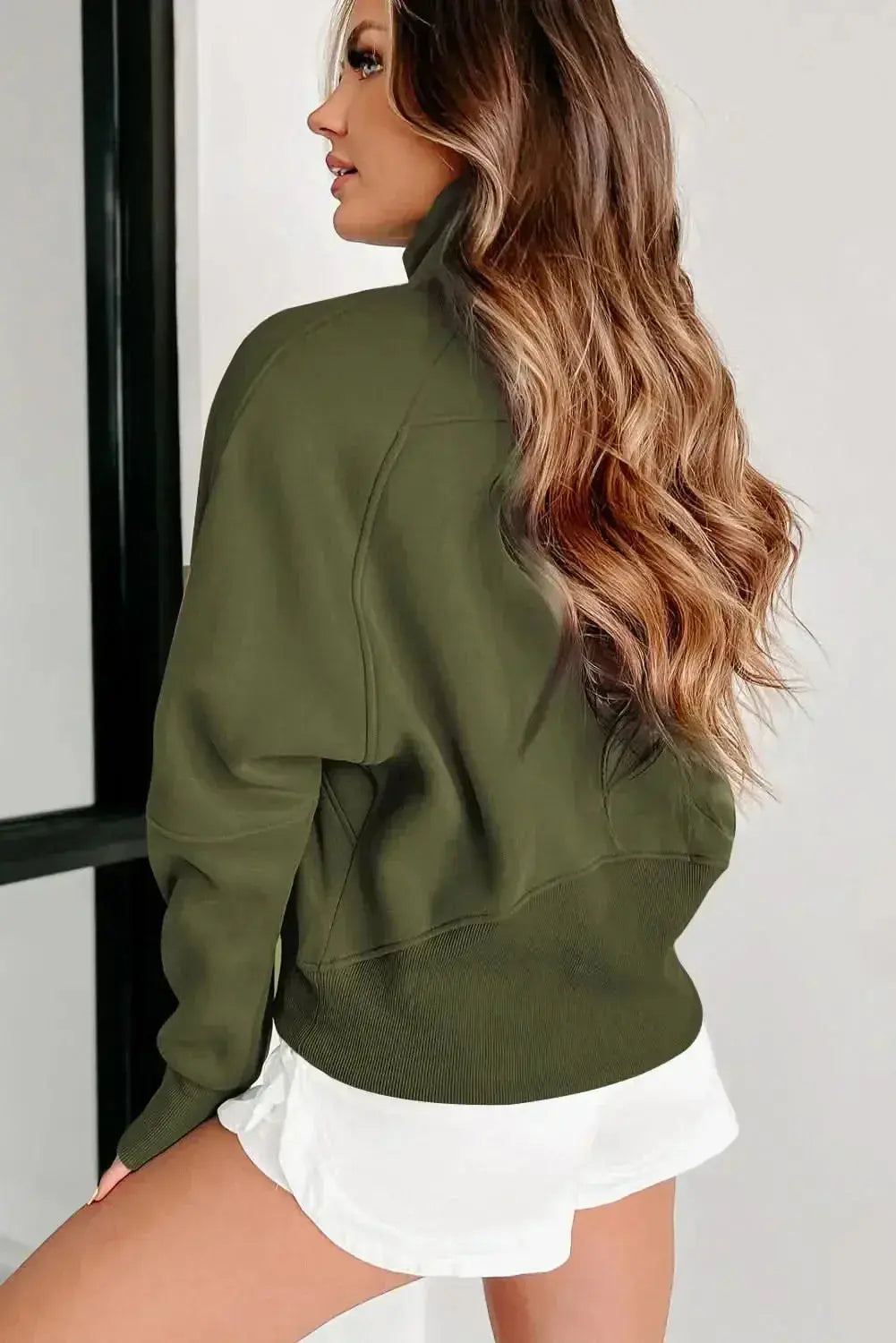 Green ribbed zip stand-collar sweatshirt for women with thumbhole sleeves, by Gilded Glamour Shop, casual and comfortable fit.