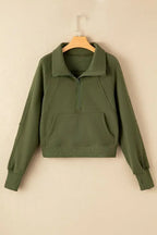 Green ribbed zip sweatshirt with stand collar and thumbhole sleeves, stylish women's hoodie by Gilded Glamour Shop.
