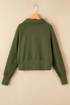 Women's green ribbed zip stand-collar sweatshirt with thumbhole sleeves from Gilded Glamour Shop.
