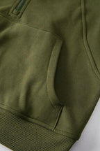 Green ribbed zip-up sweatshirt with stand collar and thumbhole sleeves, stylish women's hoodie by Gilded Glamour Shop.