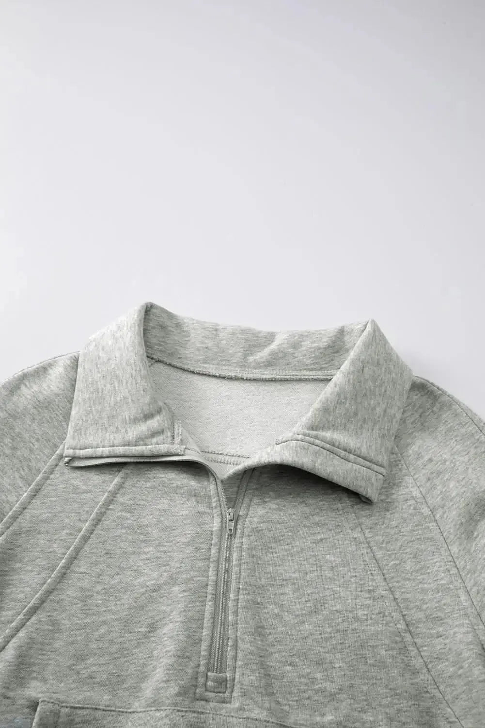 Green ribbed zip sweatshirt with stand collar and thumbhole sleeves, women's hoodie by Gilded Glamour Shop.