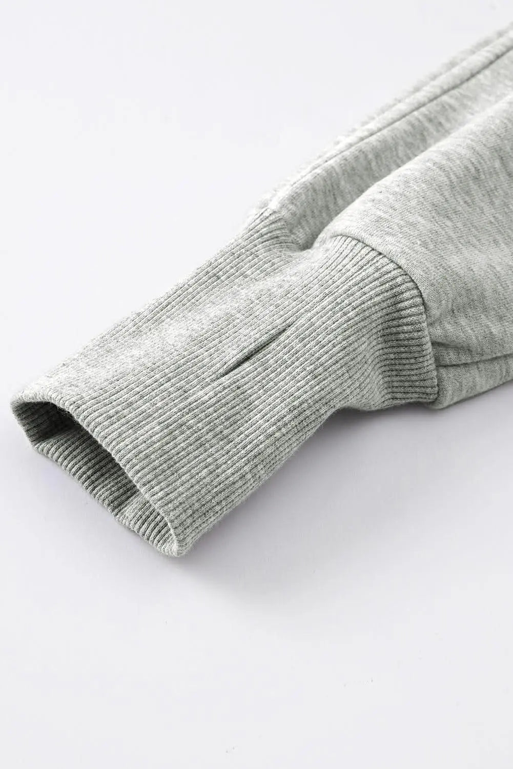 Green ribbed zip stand-collar sweatshirt for women with thumbhole sleeves by Gilded Glamour Shop, casual and stylish.