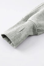 Green ribbed zip stand-collar sweatshirt for women with thumbhole sleeves by Gilded Glamour Shop, casual and stylish.
