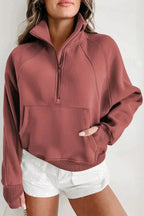 Women's green ribbed zip-up sweatshirt with stand collar and thumbhole sleeves, from Gilded Glamour Shop.