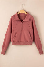 Green ribbed zip sweatshirt for women with stand collar and thumbhole sleeves, by Gilded Glamour Shop.