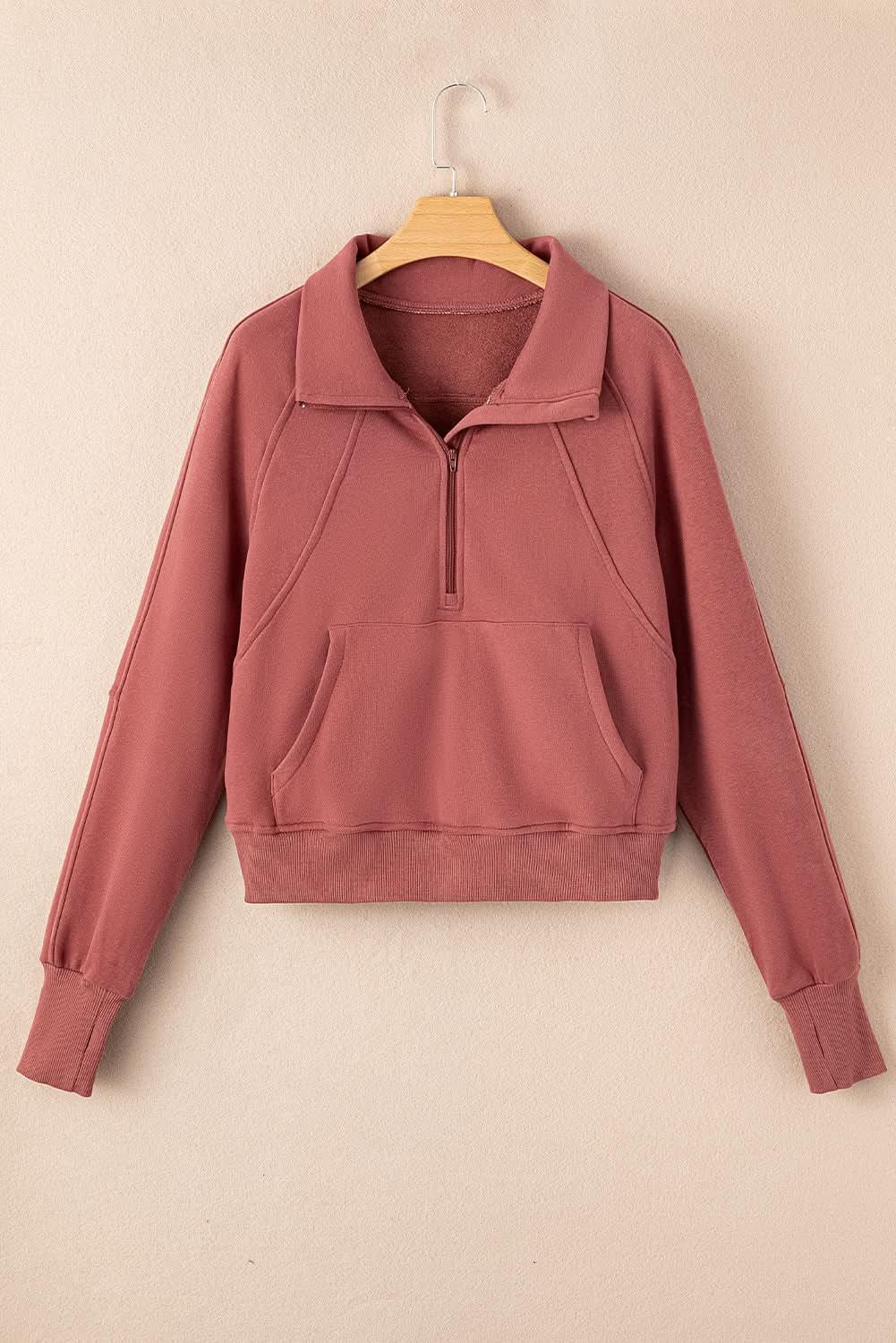 Green ribbed zip sweatshirt for women with stand collar and thumbhole sleeves, by Gilded Glamour Shop.