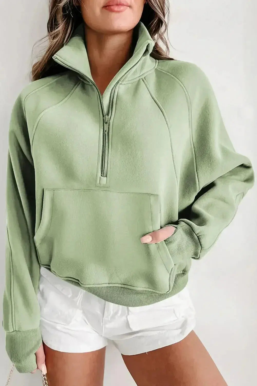 Green ribbed zip stand-collar sweatshirt for women with thumbhole sleeves, by Gilded Glamour Shop, casual and cozy style.