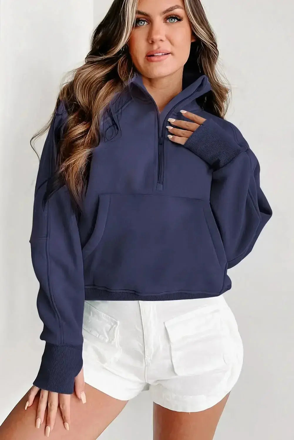 Green ribbed zip-up sweatshirt with stand collar and thumbhole sleeves by Gilded Glamour Shop, women's casual hoodie.