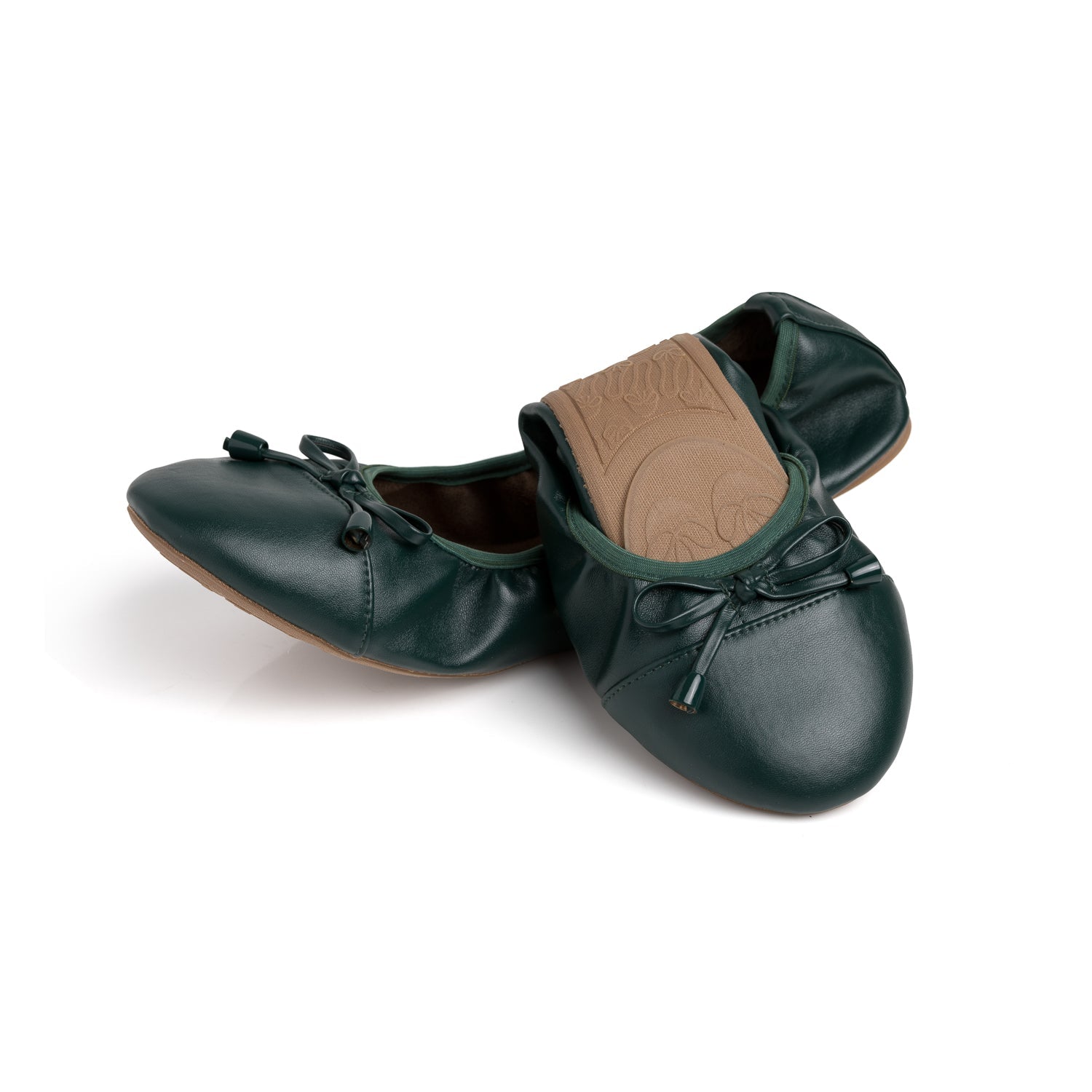 Green Talaria Flats footwear with a sleek, half-folded design showcasing the premium evergreen color and stylish structure.