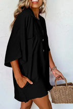 Lightweight women's half-button collared shirt romper by Plush Fashion Hub, versatile one-piece dress with a collared neckline.