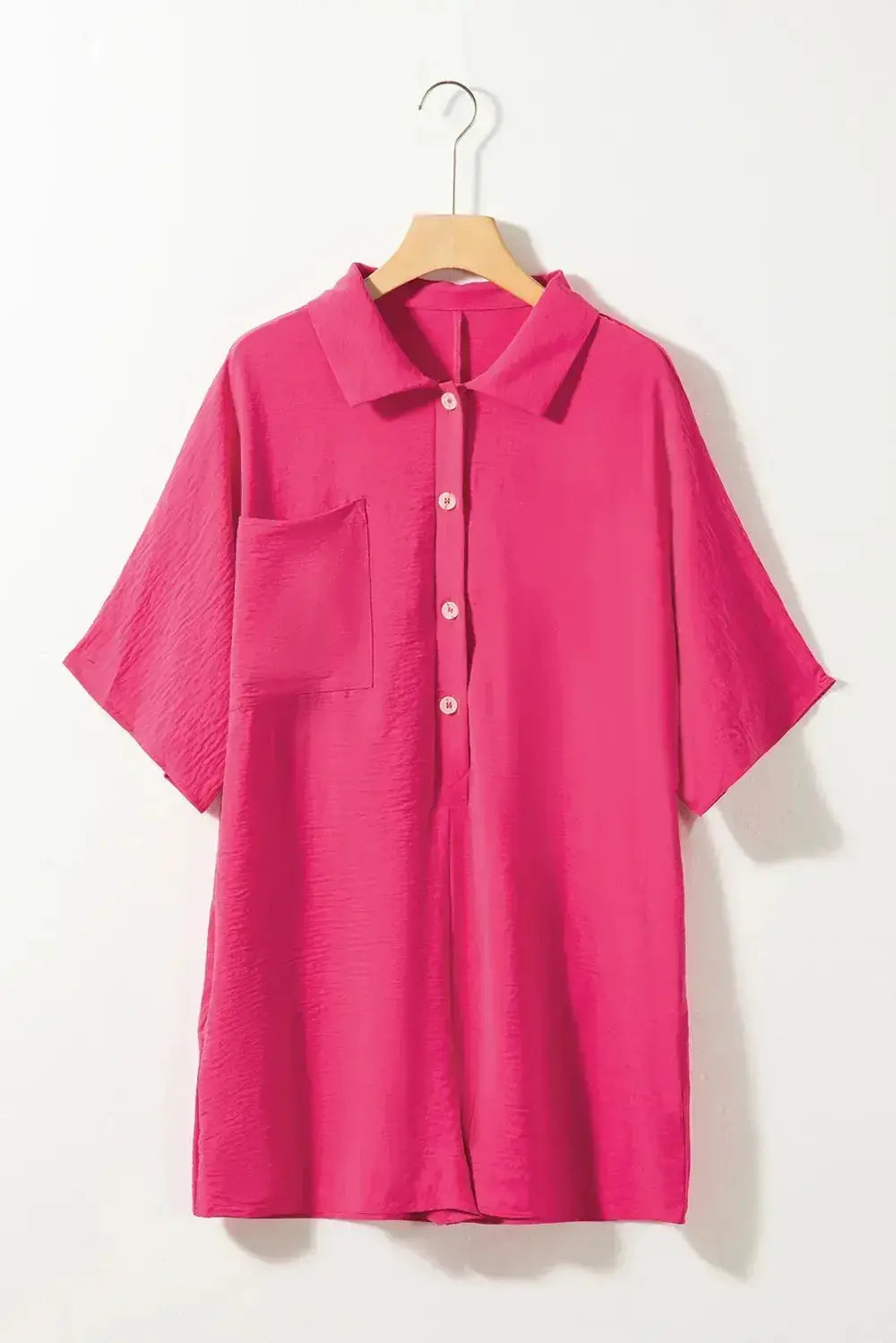 Women's lightweight half-button collar shirt romper by Plush Fashion Hub, featuring a versatile one-piece design and collar detail.
