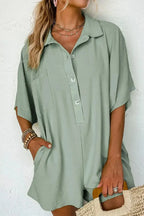 Women's half-button collared shirt romper by Plush Fashion Hub, lightweight and versatile one-piece shirt dress with a collar and short sleeves.