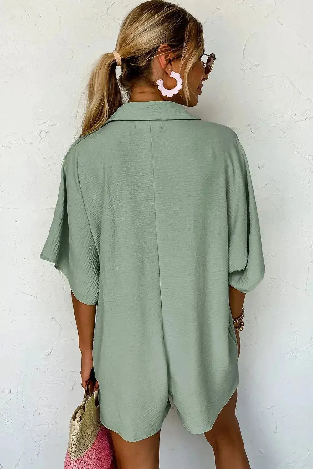 Women's lightweight half-button collar shirt romper, versatile one-piece dress in a relaxed fit with short sleeves.