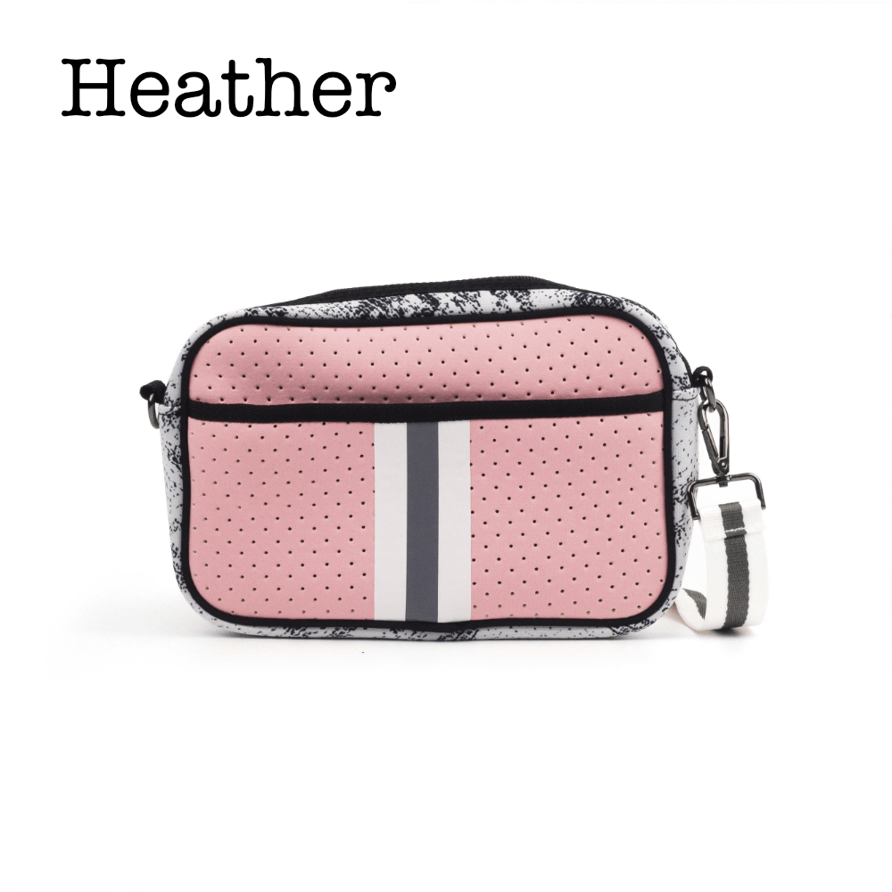 Heather gray neoprene crossbody bag by Threaded Pear with adjustable strap and sleek design for everyday use.