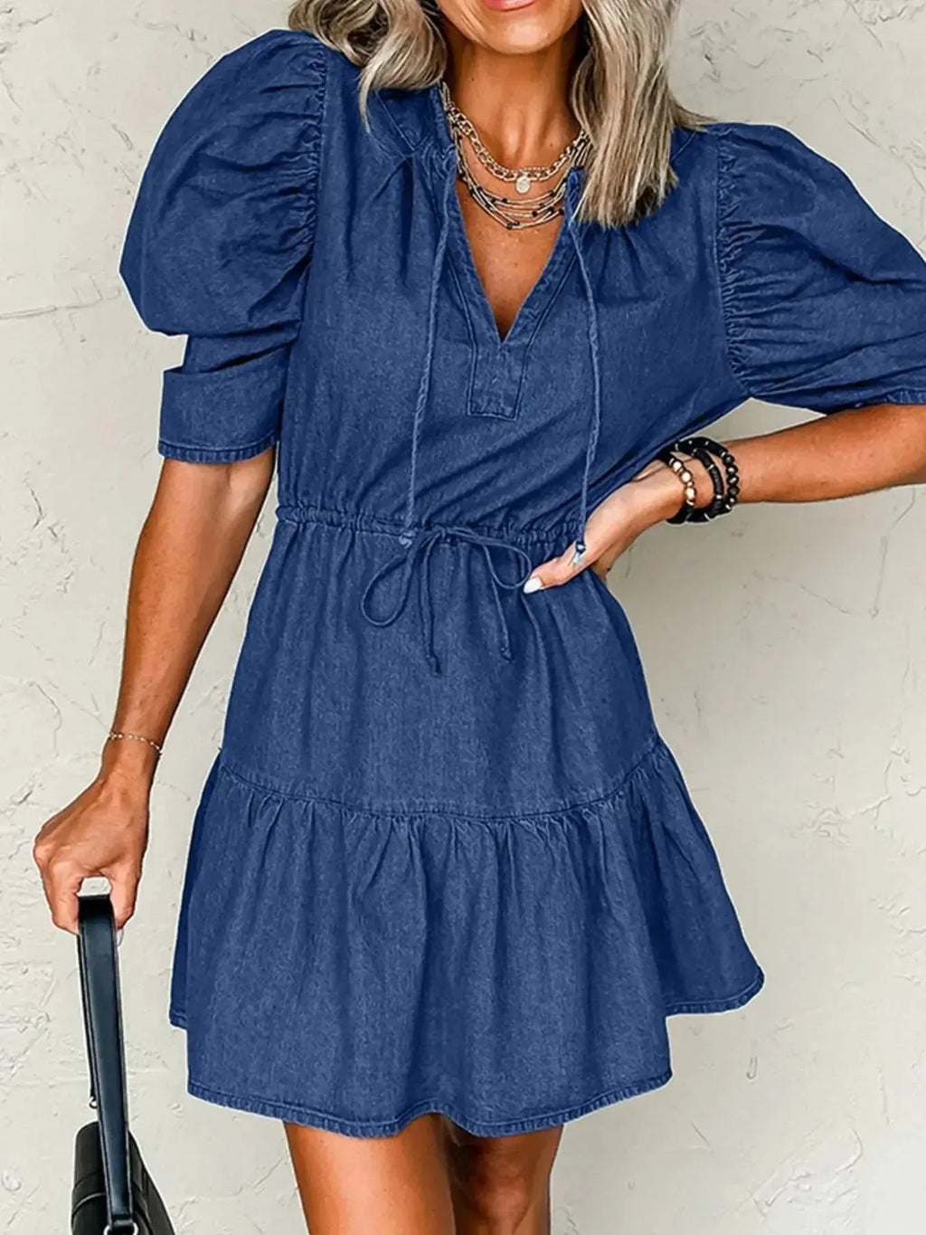 High-waist puff sleeve denim mini dress by Trendsi, made of soft cotton blend, perfect for casual summer wear.