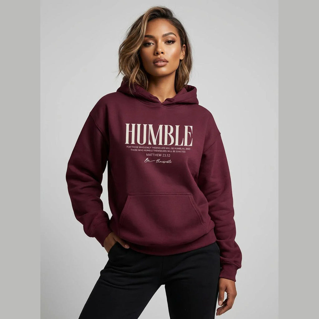 Unisex Humble Hoodie by Wear Your Worship, casual apparel featuring a comfortable fit and stylish design, shown in a lifestyle setting.