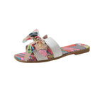 Women's flat summer slippers with bow detail from Trendy Attic Store01, featuring a comfortable sandal design with stylish accents.