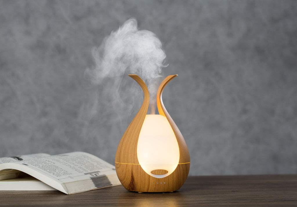 Timeless Diffuser from Timeless Organics Skin Care with elegant design, showcasing the diffuser with aromatic essential oils.
