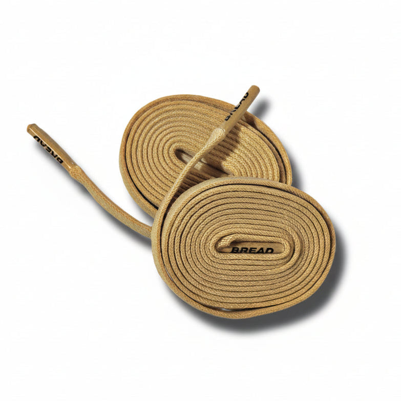 Desert tan elastic shoelace by Plush Fashion Hub, showing close-up of flexible, durable laces for athletic or casual shoes.