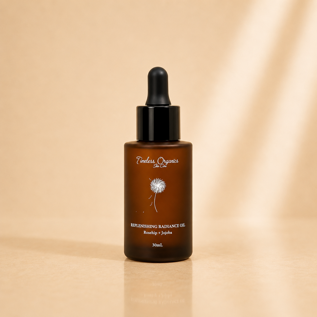 Replenishing Radiance Oil serum by Timeless Organics Skin Care, featuring a dropper bottle with golden oil and natural botanical ingredients.