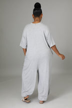 Fasheabe Justine Stretch Jumpsuit playsuit in black with fitted style, short sleeves, and V-neck design visible in the image.