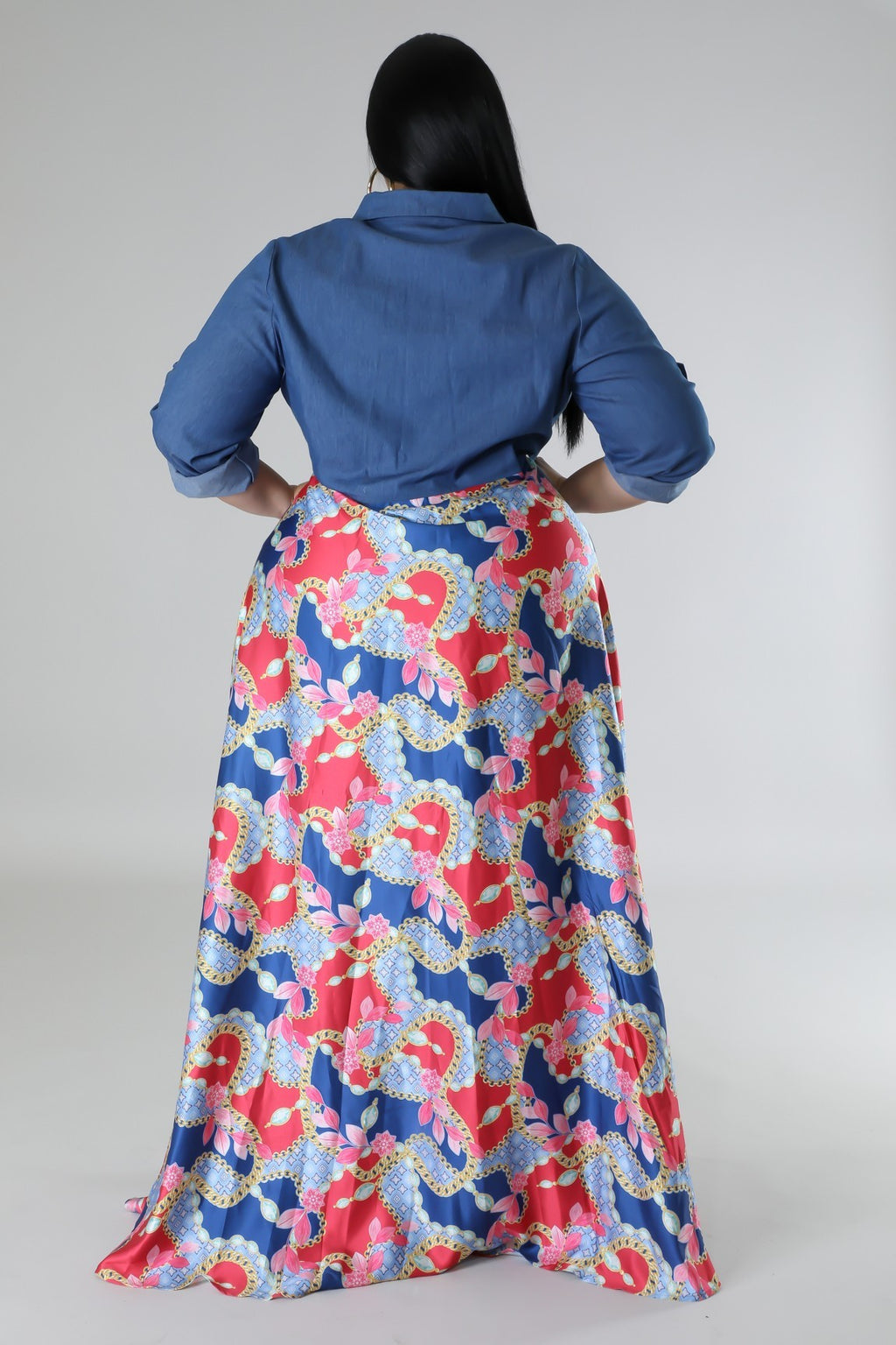 Fasheabe Jaccina plus size dress with floral pattern, sleeveless design, and flowing fabric, suitable for casual or party wear.