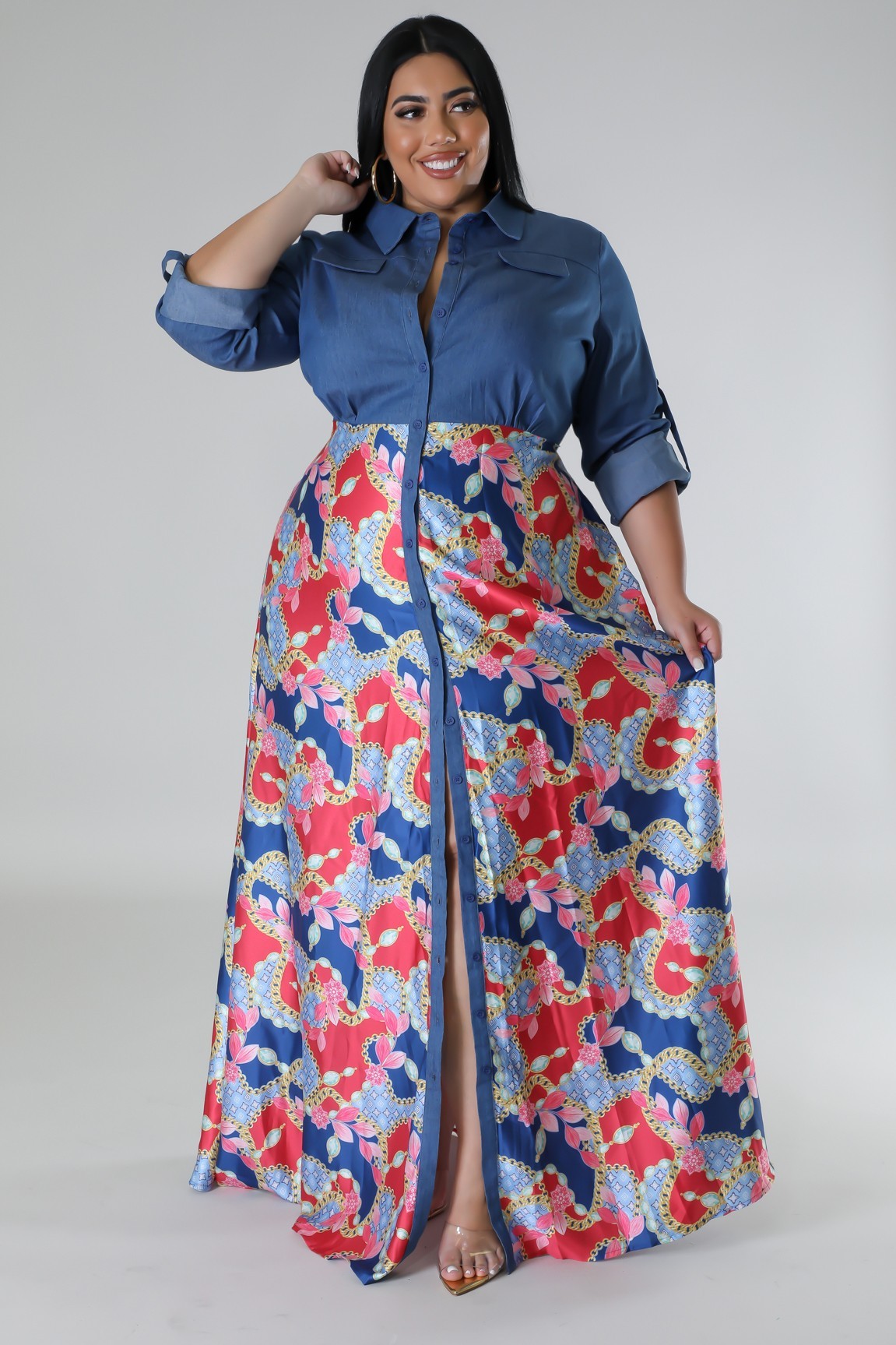 Fasheabe Jaccina plus size dress with floral pattern, flowing fabric, and V-neck design, suitable for casual or semi-formal wear.