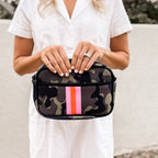 Neoprene Crossbody bag by Threaded Pear featuring a sleek design with adjustable strap and zip closure, perfect for everyday use.