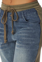 April straight leg denim jean sweatpants by The House of Stylez with classic blue denim, front pockets, and relaxed fit.