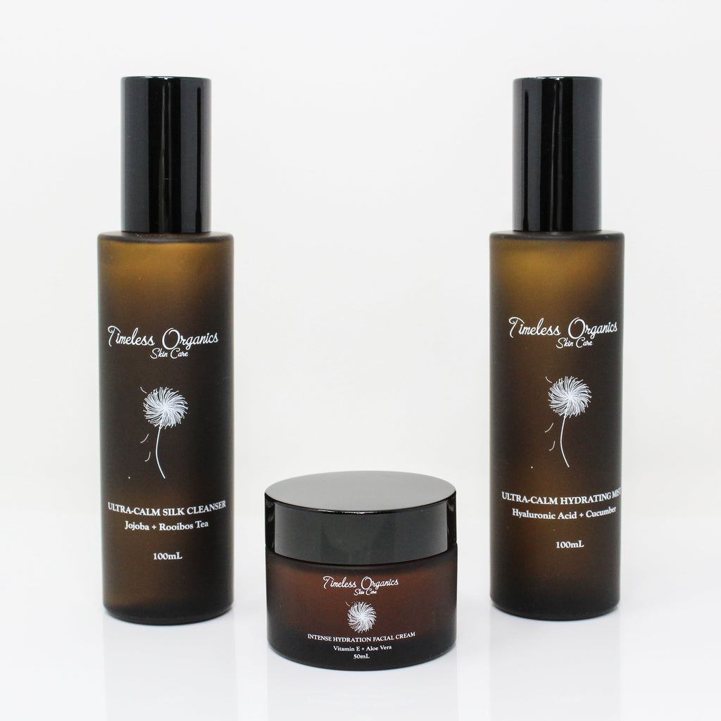 Timeless Organics Skin Care Ultra-Calm Moisturizing Kit with soothing creams and serums, displayed in a skincare set on a neutral background.